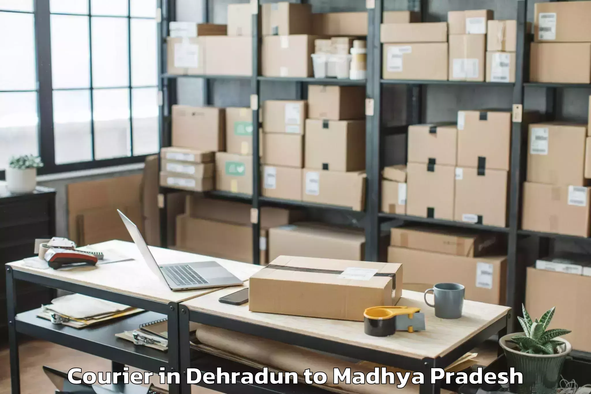 Easy Dehradun to Manpur Courier Booking